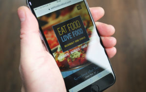 Eat Food Love Food responsive website on phone screen